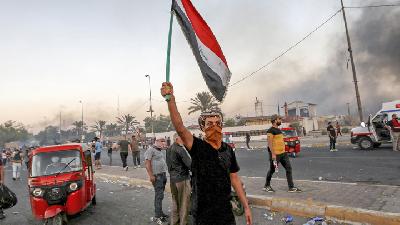 Unjuk rasa antipemerintah di Baghdad, Irak, 5 Oktober lalu. REUTERS/Thaier Al-Sudani