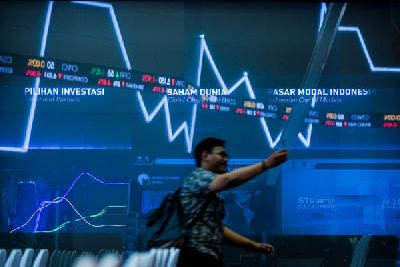 Pergerakan indeks harga saham gabungan di lantai Bursa
Efek Indonesia, Jakarta, 7 Oktober lalu.