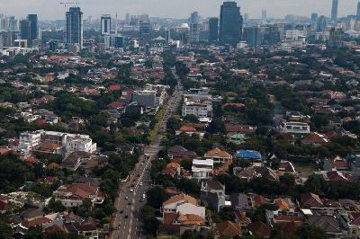 Suasana di jalan kawasan HOS Cokroaminoto di Jakarta, 23 Maret 2020. Presiden Joko Widodo telah menandatangani Perpres tentang pemanfaatan Ruang Kawasan Perkotaan Jabodetabekpunjur.  Tempo/Tony Hartawan