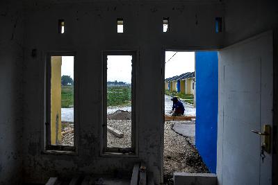 Pembangunan perumahan di kawasan Buni Bakti, Babelan, Bekasi, Jawa Barat, 8 Juli 2020. Seluruh pekerja akan mempunyai tapera baik Pegawai Negeri Sipil maupun swasta. Tempo/Tony Hartawan