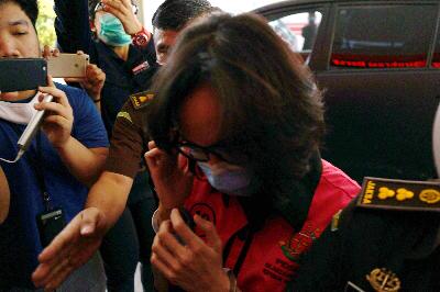 Tersangka kasus pencucian uang Pinangki Sirna Malasari tiba menjalani pemeriksaan di Gedung Kejaksaan Agung, Jakarta, 2 September 2020.  TEMPO/Muhammad Hidayat