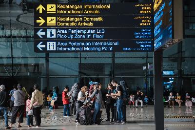 Penumpang saat tiba di Terminal 3 Kedatangan Internasional Bandara Soekarno-Hatta, Tangerang, 5 Maret 2020. TEMPO/M Taufan Rengganis