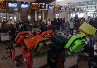 Calon jamaah umrah melakukan lapor diri di Terminal 3 Bandara Soekarno Hatta, Tangerang, Banten, 1 November 2020. ANTARA/Muhammad Iqbal