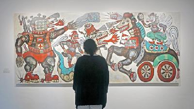 Lukisan karya Heri Dono berjudul Battle of the Invisible Enemies di Galeri Srisasanti Syndicate Tirtodipuran, Yogyakarta. TEMPO/Shinta Maharani