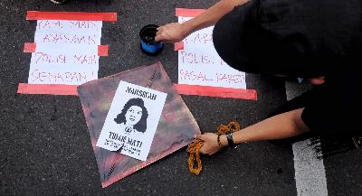 Aksi peringatan Hari Hak Asasi Manusia di depan Istana Merdeka Jakarta, Desember 2019. TEMPO/Hilman Fathurrahman W