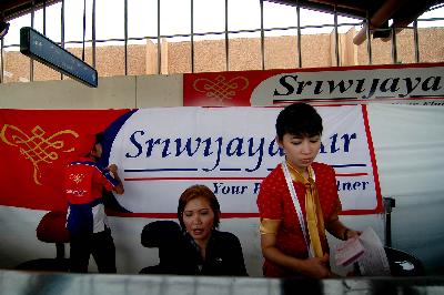 Loket penjualan tiket maskapai penerbangan Sriwijaya Air di Bandara Soekarno-Hatta, Cengkareng, Tangerang, Banten, Oktober 2009. Dok.TEMPO/ Tri Handiyatno
