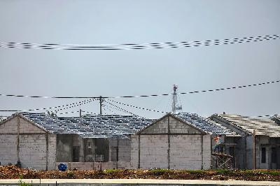 Pembangunan perumahan di Desa Buni Bakti, Kecamatan Babelan, Bekasi, Jawa Barat, 26 Desember 2019. TEMPO/Tony Hartawan

