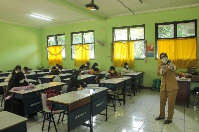 Kegiatan pembelajaran tatap muka di SMP Negeri 2 Bekasi, Kota Bekasi, Jawa Barat, 22 Maret 2021. TEMPO/Hilman Fathurrahman W