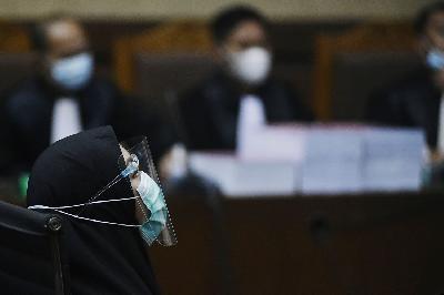Terdakwa Jaksa, Pinangki Sirna Malasari, mengikuti sidang pembacaan surat tuntutan, di Pengadilan Tindak Pidana Korupsi, Pengadilan Negeri Jakarta Pusat, 11 Januari 2021. TEMPO/Imam Sukamto