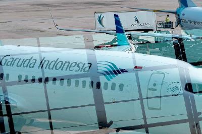 Pesawat Garuda Indonesia di Terminal 3 Sukarno Hatta, Tanggerang, Banten. Tempo/Tony Hartawan