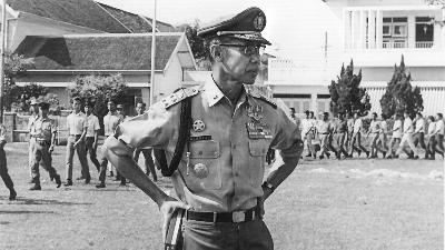 National Police Chief Hoegeng Iman Santoso  supervising the preparation of a ceremony at the National Police Headquarters, Jakarta, between 1968-1971.
Family Doc. 
