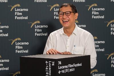 Sutradara "Seperti Dendam. Rindu Harus dibayar Tunas", Edwin meraih Golden Leopard dalam sesi Concorso Internazionale  Locarno Film Festival ke-74 di Locarno, Swiss, 8 Agustus 2021. Dok. Locarno Film Festival/Ti-Press/Samuel Golay