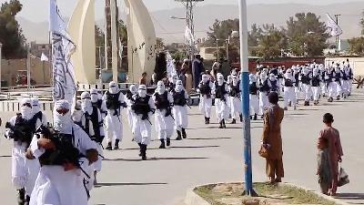 Taliban fighters march in uniforms on the street in Qalat, Zabul Province, Afghanistan, August 19 
Reuters
