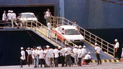 The first Timor cars imported from South Korea arrive in Jakarta harbor, August 29, 1996.
Reuters
