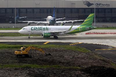 Pesawat Citilink di terminal 1 Bandara Soekarno-Hatta, Tangerang, Banten. TEMPO/Tony Hartawan