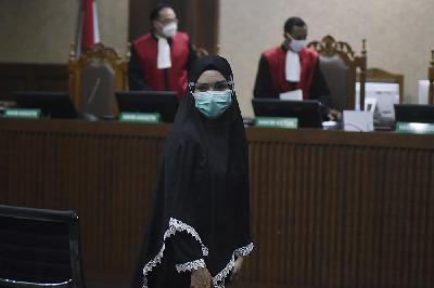 Terdakwa Jaksa, Pinangki Sirna Malasari, mengikuti sidang pembacaan surat tuntutan di Pengadilan Tindak Pidana Korupsi pada Pengadilan Negeri Jakarta Pusat, 11 Januari 2021. TEMPO/Imam Sukamto