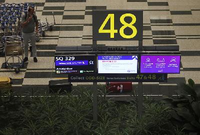 Bandara Udara Changi pada pemberlakuan skema perjalanan bebas karantina Vaccinated Travel Lane (VTL) di Singapura, 20 Oktober 2021. REUTERS/Edgar Su