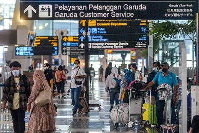 Papan penunjuk pelayanan pelanggan pesawat Garuda di Terminal 3 Bandara Internasional Sukarno Hatta, Tengerang, Banten, 25 Oktober 2021. Tempo/Tony Hartawan