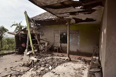 Kondisi rumah warga yang rusak akibat erupsi Gunung Semeru di Desa Supiturang, Kecamatan Pranajiwa, Lumajang, Jawa Timur, 5 Desember 2021. TEMPO/Aris Novia Hidayat