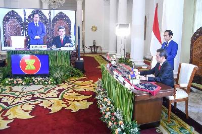 Presiden Jokowi menyaksikan penandatanganan perjanjian RCEP darii Istana Kepresidenan Bogor, Jawa Barat, 15 November 2021. setkab.go.id/Biro Pers Setpres/Muchlis Jr