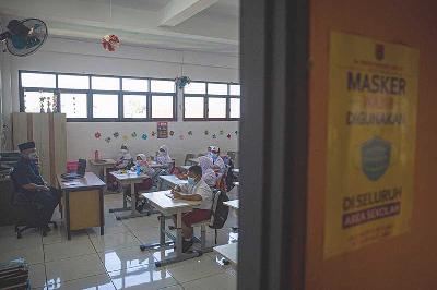 Pembelajaran Tatap Muka (PTM) di SDN 01 Pondok Bambu, Jakarta, 13 Januari 2022. TEMPO/Muhammad Hidayat