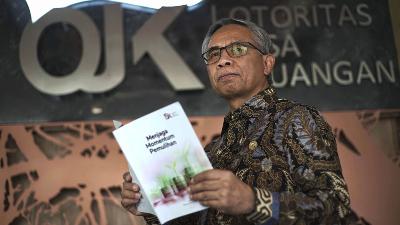 Ketua Dewan Komisioner Otoritas Jasa Keuangan (OJK) Wimboh Santoso di Solo, Jawa Tengah, 22 Februari 2022. TEMPO/Budi Purwanto      
