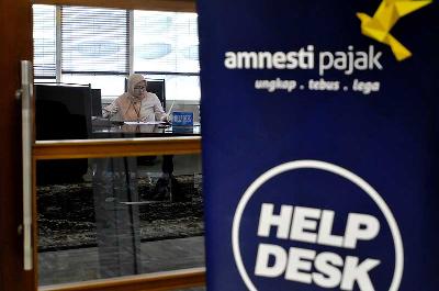 Kantor pelayanan pengampunan pajak (tax amnesty) di Kantor Pelayanan Pajak Sudirman, Jakarta. TEMPO/Tony Hartawan