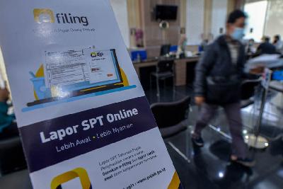 Papan penunjuk Lapor SPT Online pada pelayanan KPP Pratama Jakarta Kebayoran Baru Satu di Jakarta. Tempo/Tony Hartawan