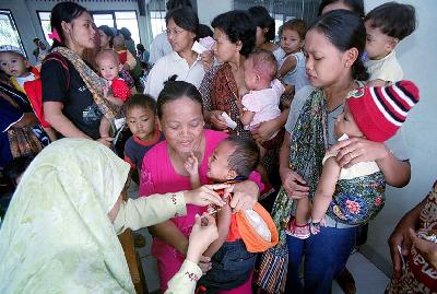 Ilustrasi imunisasi Hepatitis di kantor Kelurahan Karet Kuningan, Jakarta. Dokumentasi TEMPO/ Agung Rahmadiansyah