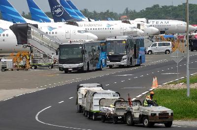 Pesawat Garuda Indonesia di Bandara Internasional Soekarno Hatta, Cengkareng, Tangerang, Banten. TEMPO/Tony Hartawan