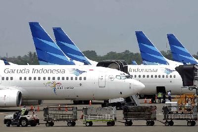 Pesawat Garuda Indonesia di Terminal 3 Bandara Soekarno-Hatta, Tangerang. TEMPO/Tony Hartawan