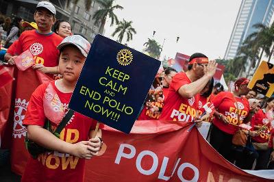 Aksi kampanye basmi penyakit Polio dalam Car Free Day di Bundaran HI, Jakarta. TEMPO/M Taufan Rengganis