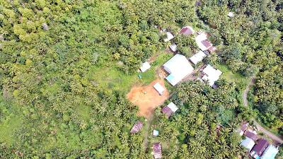 Foto Udara lokasi Konsesi tambang PT Tambang Mas Sangihe, di Pulau Sangihe, Sulawesi Utara, Maret 2022/Yunita