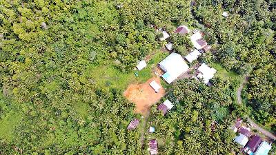 Aerial photograph of Tambang Mas Sangihe’s concession area in Sangihe Island, North Sulawesi, March 2022. / Yunita