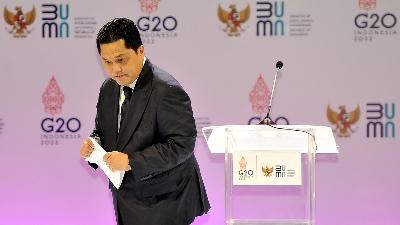 SOEs Minister Erick Thohir leaves the podium after delivering a presentation during the opening of the State-Owned Enterprises International Conference in Bali, October 17.
ANTARA/Nyoman Hendra Wibowo
