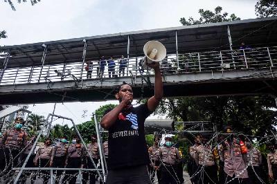 Aksi damai terkait Papua di Patung Kuda, Medan Merdeka Barat, Jakarta, 2020. Tempo/Hilman Fathurrahman W