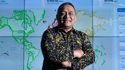 Indonesian Migrant Workers Protection Agency (BP2MI) Chairman Benny Rhamdani poses after an interview with Tempo at the BP2MI office in Jakarta, April 28. 
Tempo/Tony Hartawan
