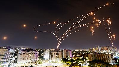 Israel’s Iron Dome anti-missile system intercepts rockets launched from the Gaza Strip, as seen from the city of Ashkelon, Israel, October 9. 
REUTERS/Amir Cohen
