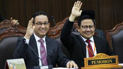 Presidential candidate Anies Baswedan (left) and his running mate Muhaimin Iskandar, at the start of the first session of the 2024 presidential election dispute hearing at the Constitutional Court building, Jakarta, March 27. 
TEMPO/Subekti
