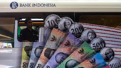Mobil kas keliling yang melayani penukaran uang pecahan rupiah di Pasar Pramuka, Jakarta, 20 Maret 2024. TEMPO/Tony Hartawan