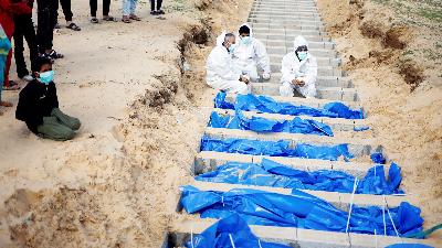 Pemakaman warga Palestina, di kuburan massal, Rafah, di Jalur Gaza, 30 Januari 2024. REUTERS/Mohammed Salem/File Foto