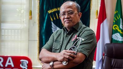 Chair of the Indonesian Medical Association (IDI) Mohammad Adib Khumadi poses after an interview with Tempo at the IDI Headquarters, Jakarta, July 11.
TEMPO/Tony Hartawan
