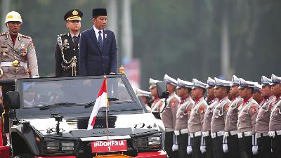 Presiden Joko Widodo menghadiri acara peringatan Hari Bayangkara ke-78 di Silang Monas, Jakarta,  1 Juli 2024/TEMPO/Subekti.