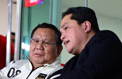 President Prabowo Subianto and SOE Minister Erick Thohir watch the Indonesian national team's match against Bahrain at Gelora Bung Karno Main Stadium in Jakarta, March 25, 2025. BPMI Setpres/Muchlis Jr