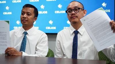 Executive Director of the Center of Economic and Law Studies (Celios) Bhima Yudhistira (right) and Celios Public Policy Director Media Wahyudi Askar submit a request to the United Nations (UN) to audit Indonesia's second-quarter 2025 economic growth data, released by the Central Statistics Agency (BPS). Courtesy of Celios