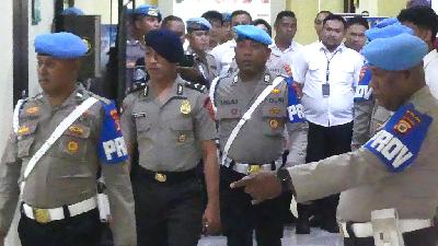 Mesias Viktor Siahaya (second from left) awaits a National Police Professional Ethics Commission hearing at the Maluku Regional Police Headquarters in Ambon, February 24, 2026. Antara/Alfian Sanusi