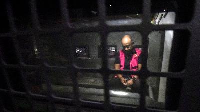 Former National Nutrition Agency (BGN) Chief Dadan Hindayana officially wears a detainee vest after questioning at the Office of the Deputy Attorney General for Special Crimes, Attorney General’s Office, Jakarta, June 3, 2026. Tempo/Imam Sukamto